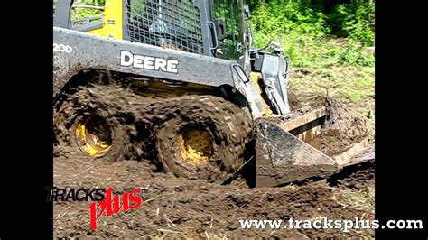 track skid steer in mud|skid steer track problems.